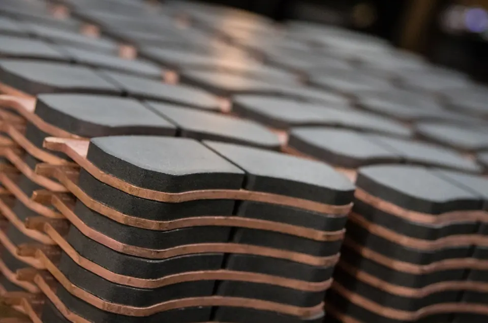 Copper-backed friction pads, manufactured in-house