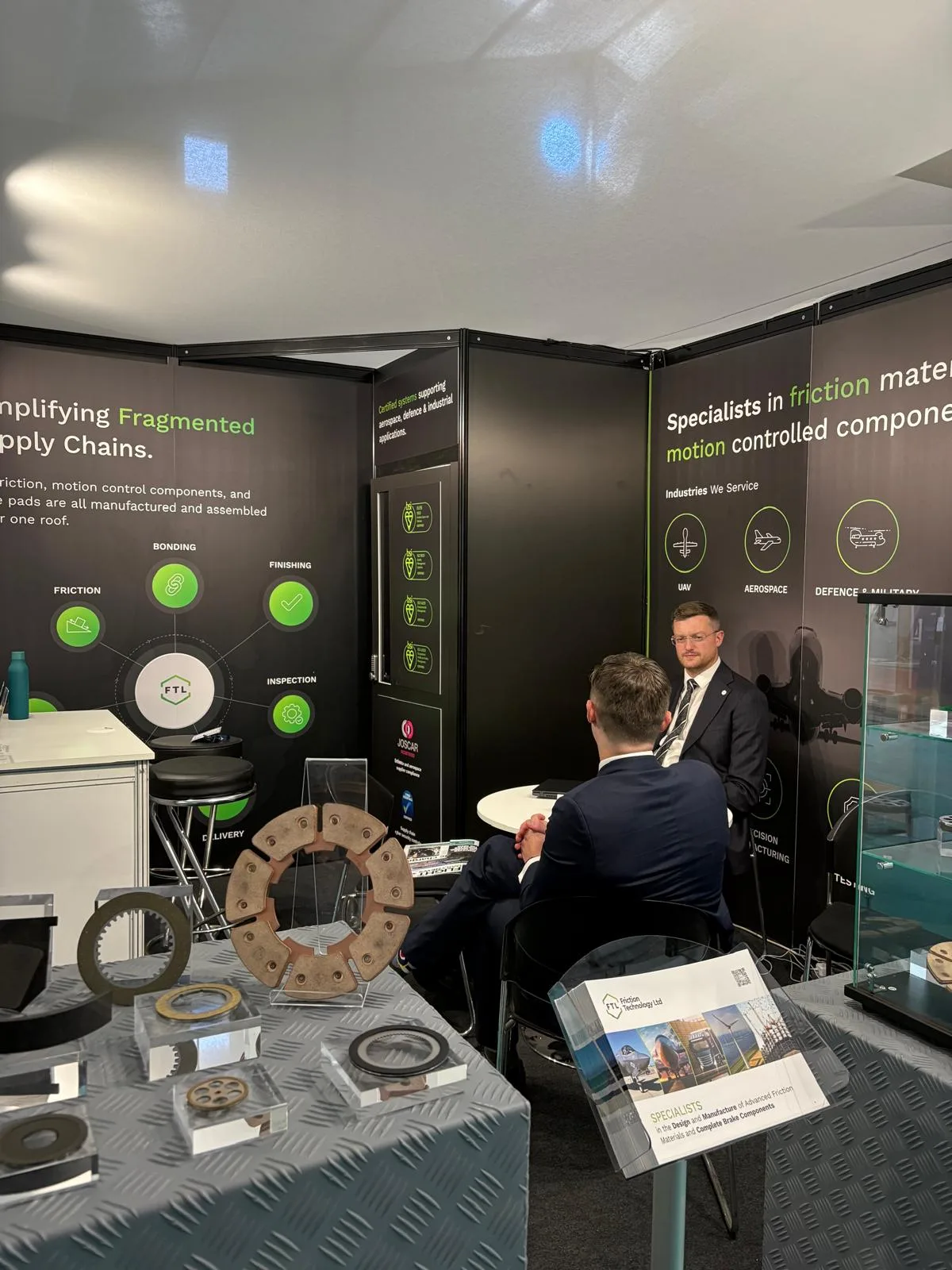 The FTL team in conversation with visitors at the Farnborough stand