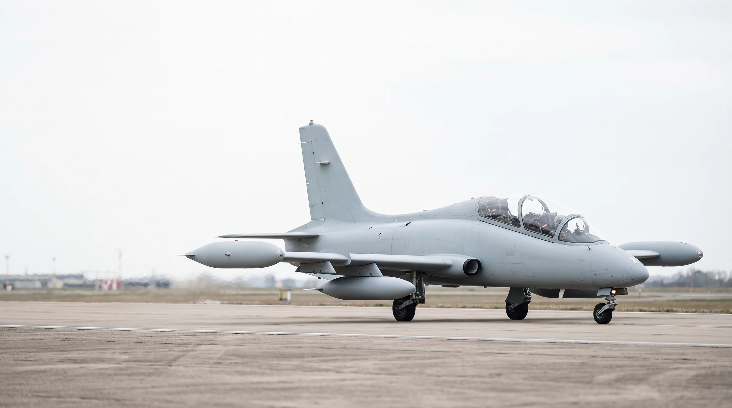 Aermacchi MB339 jet trainer taxiing on an airfield